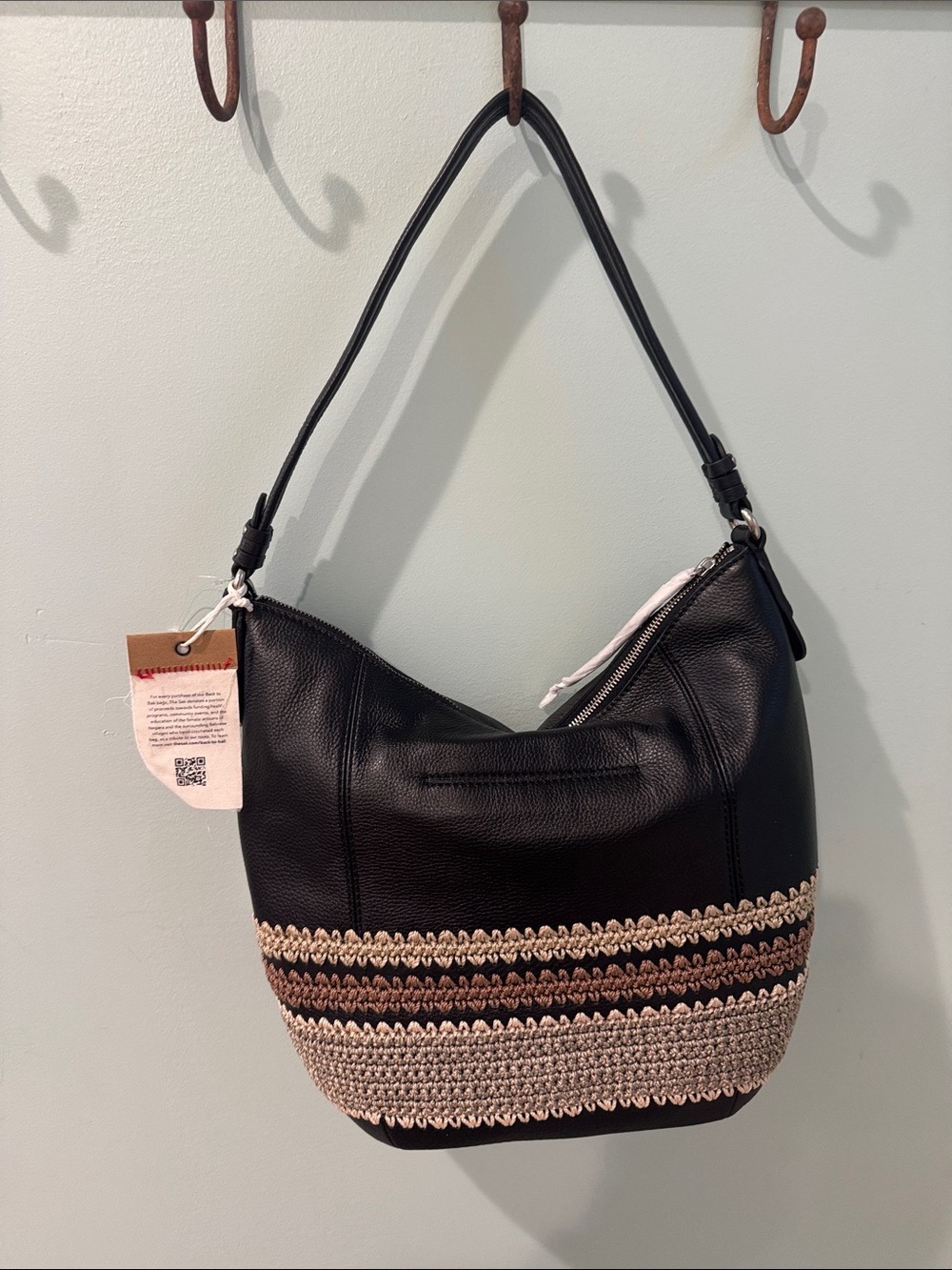 The Sak Black Leather Shoulder Hobo with Beige Woven Trim